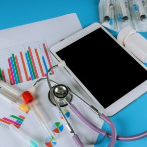 Medical statistics with tablet and stethoscope medical exam